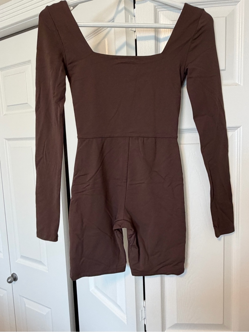 Babaton Long Sleeve One-Piece Romper in Brown Womens